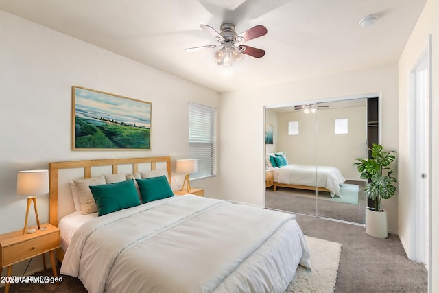 bedroom featuring a closet, carpet flooring, and a ceiling fan