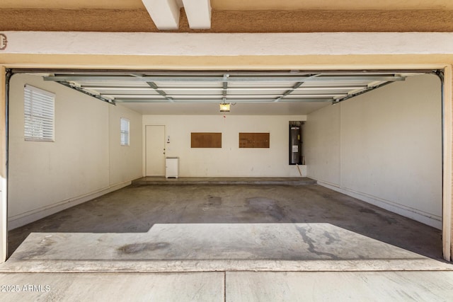 garage with a garage door opener and water heater