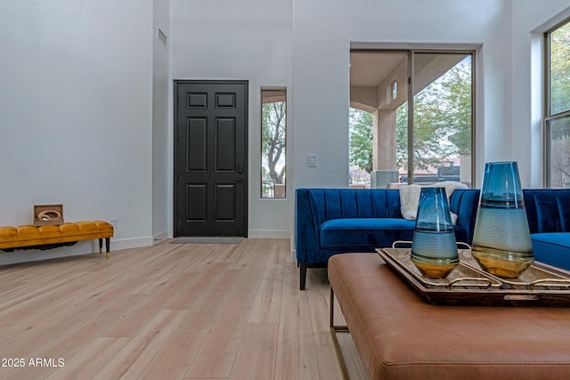 foyer with light wood-type flooring