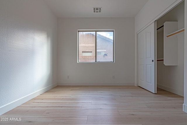 unfurnished bedroom with light hardwood / wood-style floors