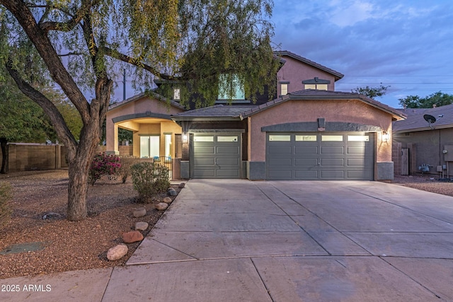 view of front of property featuring a garage