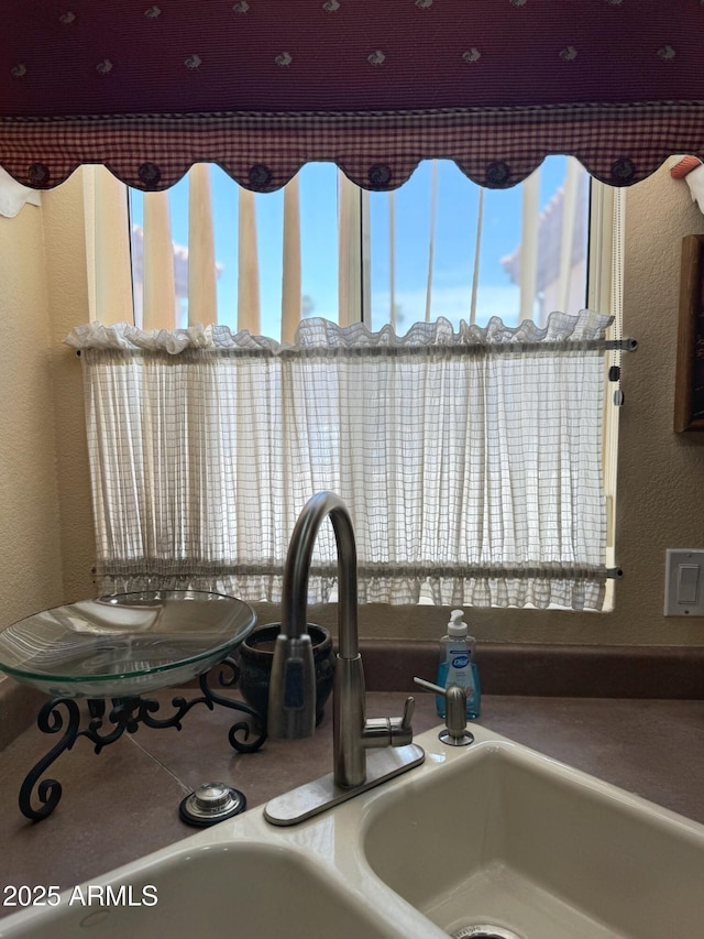 6535 E Superstition Springs Blvd Unit 217, Mesa, AZ 85206 - kitchen view of a sink and a textured wall