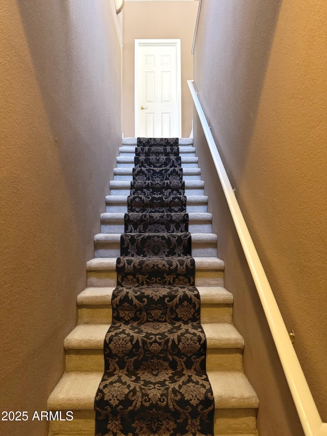 6535 E Superstition Springs Blvd Unit 217, Mesa, AZ 85206 - stairs with a textured wall