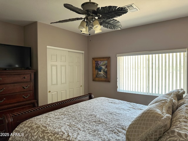 6535 E Superstition Springs Blvd Unit 217, Mesa, AZ 85206 - bedroom with a closet and a ceiling fan