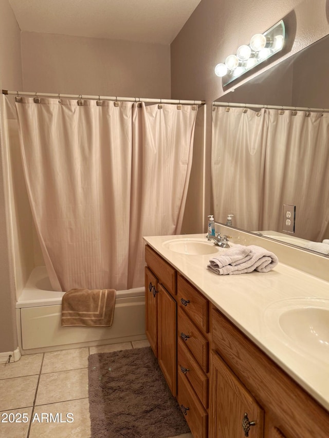 6535 E Superstition Springs Blvd Unit 217, Mesa, AZ 85206 - bathroom featuring shower / tub combo with curtain, double vanity, and tile patterned flooring