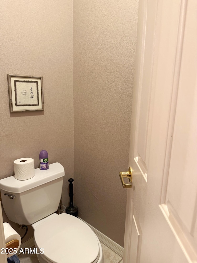 6535 E Superstition Springs Blvd Unit 217, Mesa, AZ 85206 - bathroom featuring toilet and baseboards