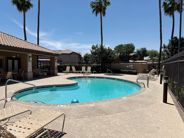 6535 E Superstition Springs Blvd Unit 217, Mesa, AZ 85206 - community pool with a patio area and fence