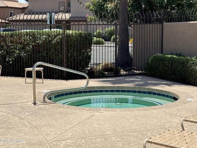 6535 E Superstition Springs Blvd Unit 217, Mesa, AZ 85206 - view of pool with fence and a community hot tub