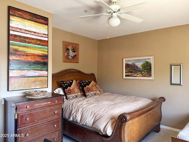 6535 E Superstition Springs Blvd Unit 217, Mesa, AZ 85206 - bedroom with carpet floors, a ceiling fan, and baseboards