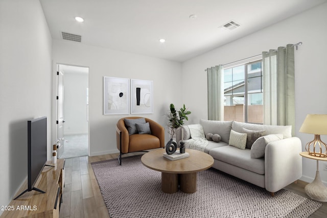 living room with light hardwood / wood-style floors