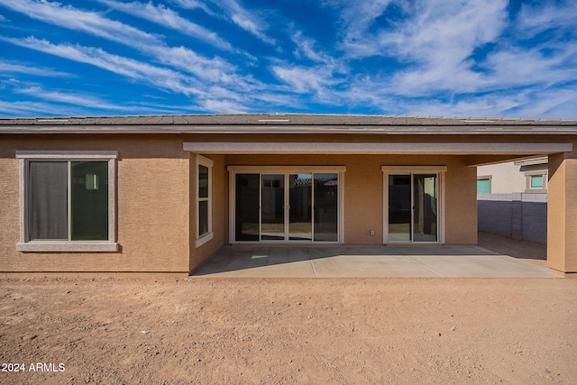 rear view of house with a patio area