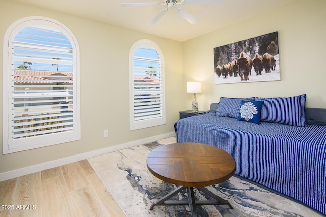 6831 S Coral Gable Dr, Chandler, AZ 85249 - bedroom featuring wood finished floors, baseboards, and a ceiling fan