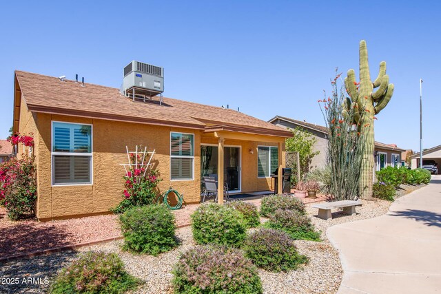 6831 S Coral Gable Dr, Chandler, AZ 85249 - view of front facade with stucco siding, central AC, and a patio