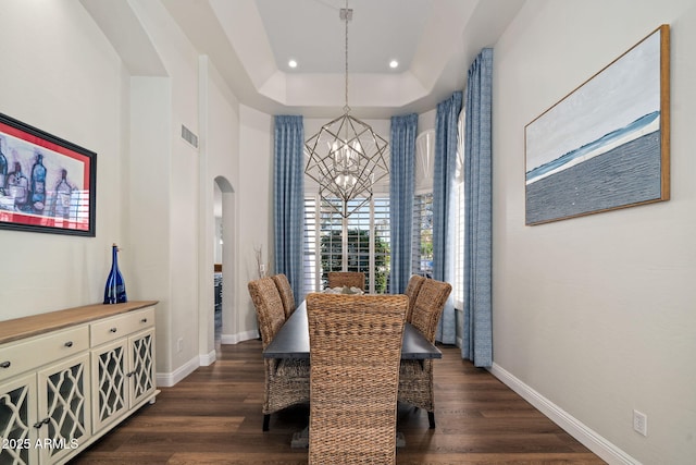 3665 S Jojoba Way, Chandler, AZ 85248 - dining room featuring a chandelier, arched walkways, baseboards, dark wood finished floors, and recessed lighting