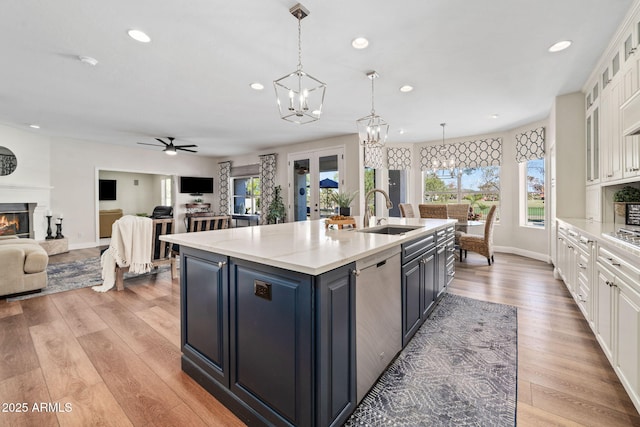 3665 S Jojoba Way, Chandler, AZ 85248 - kitchen with a sink, white cabinetry, a chandelier, dishwasher, and recessed lighting