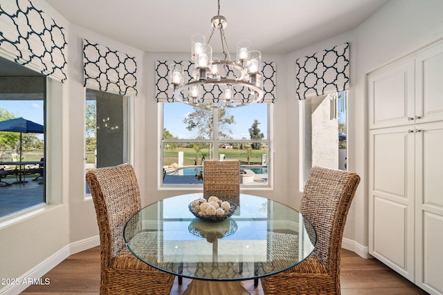 3665 S Jojoba Way, Chandler, AZ 85248 - dining area with a chandelier, dark wood finished floors, and baseboards