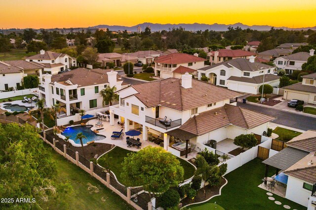 3665 S Jojoba Way, Chandler, AZ 85248 - aerial view at dusk of a residential view and view of pool area