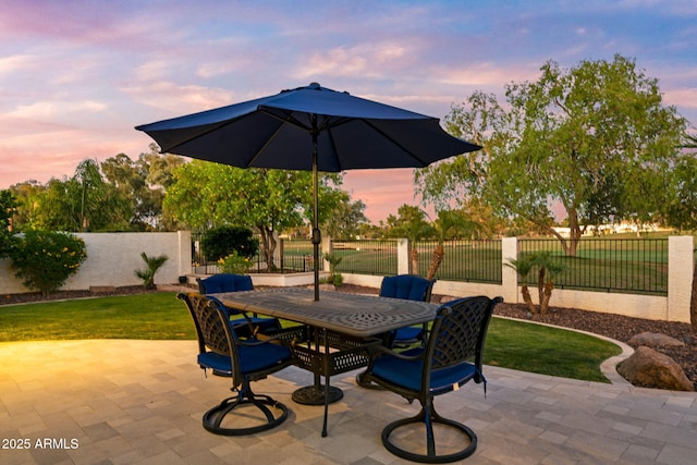 3665 S Jojoba Way, Chandler, AZ 85248 - patio terrace at dusk with outdoor dining space