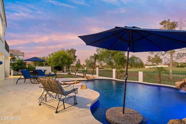 3665 S Jojoba Way, Chandler, AZ 85248 - pool at dusk with fence and a patio area
