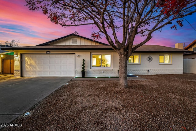 ranch-style home with a garage