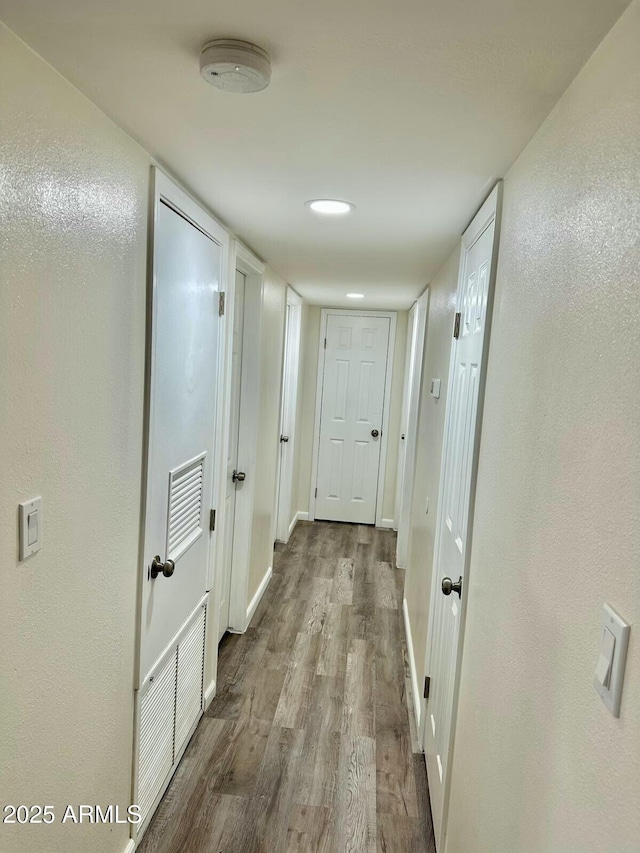 hallway featuring light hardwood / wood-style floors