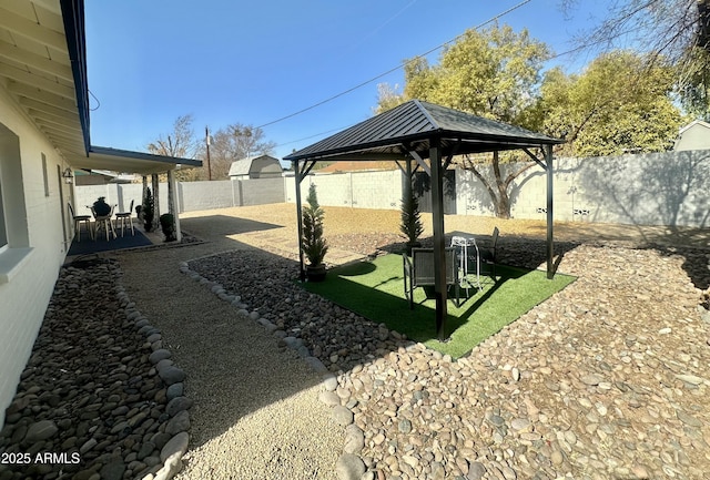 view of yard featuring a gazebo and a patio