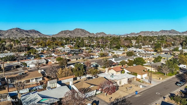 drone / aerial view featuring a mountain view