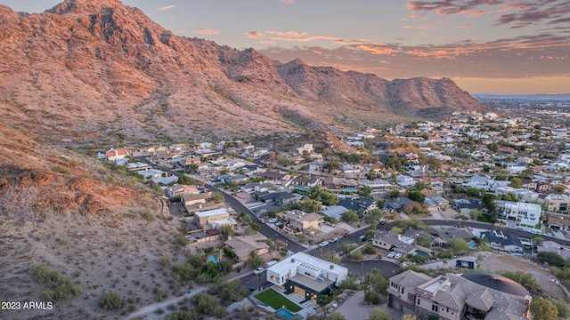 aerial view at dusk with a mountain view