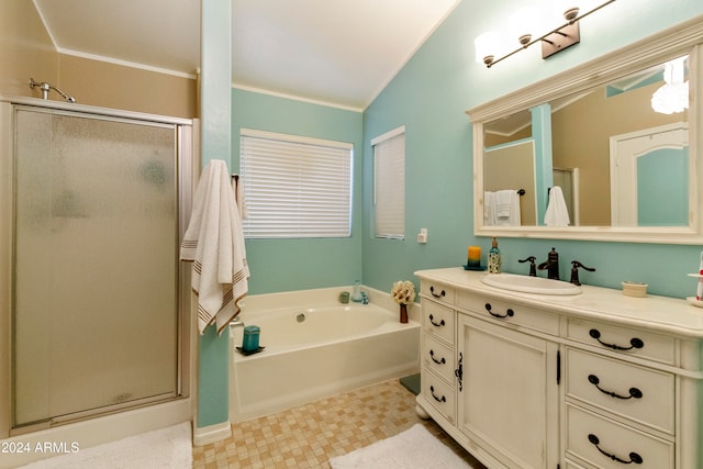 bathroom with vanity, ornamental molding, plus walk in shower, and vaulted ceiling