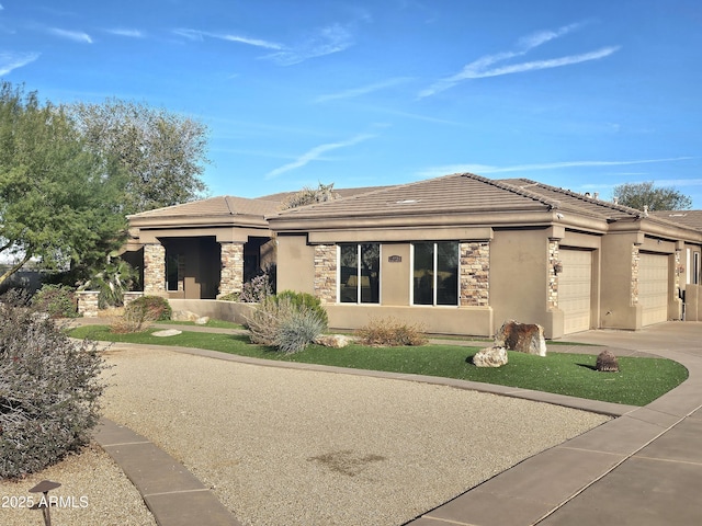 prairie-style house featuring a garage