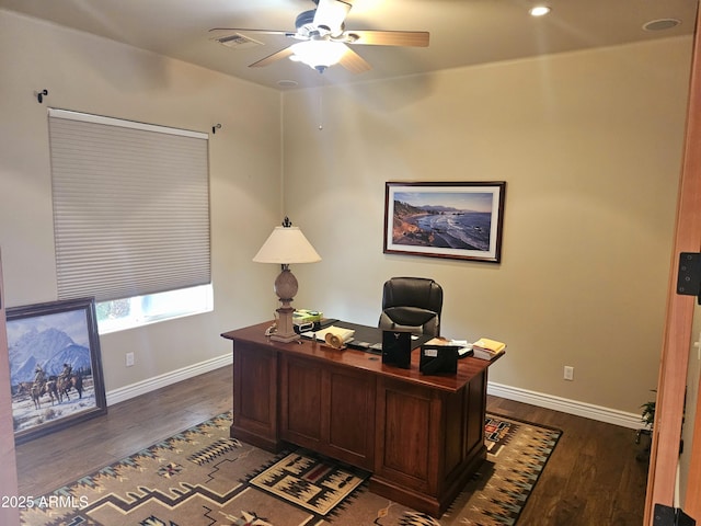 office area featuring dark wood-type flooring and ceiling fan