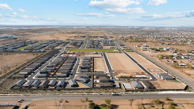 aerial overview of property's location featuring nearby suburban area