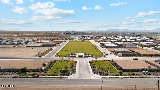 aerial view of residential area featuring a mountainous background