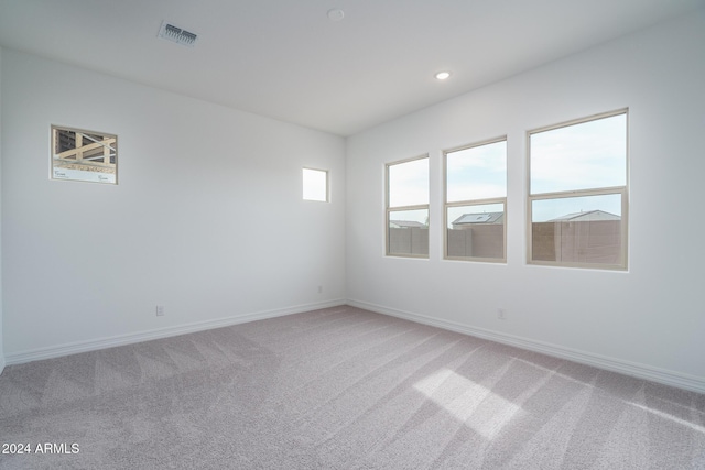 spare room with carpet floors