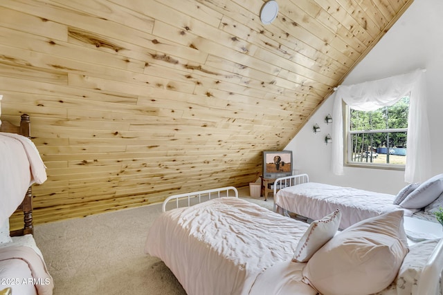 bedroom with carpet flooring, wood ceiling, and vaulted ceiling