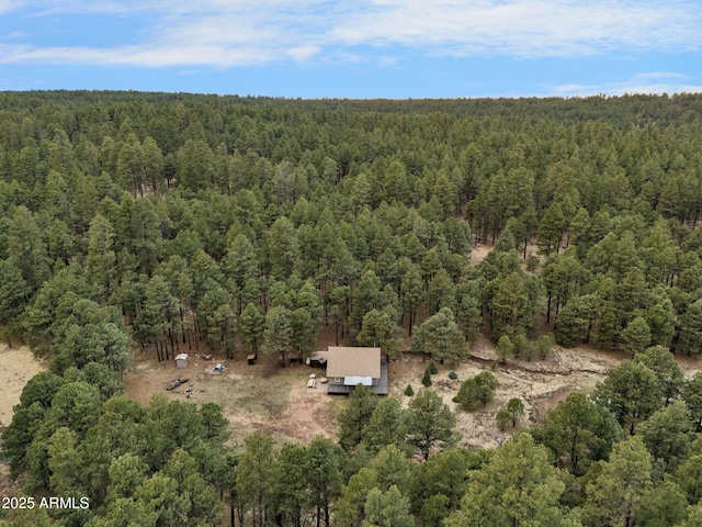aerial view featuring a view of trees