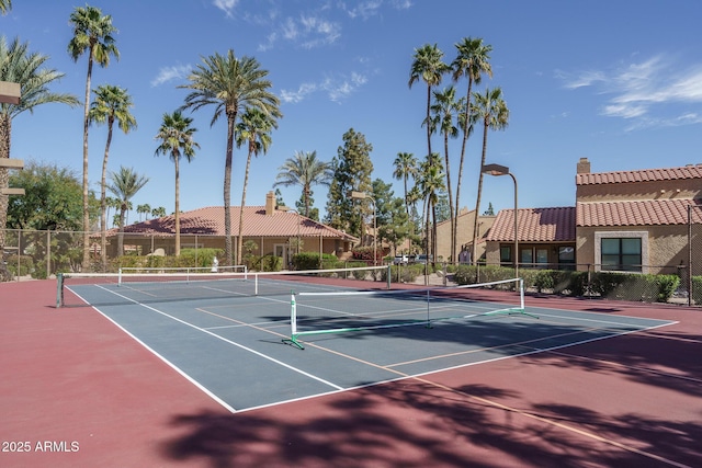 view of sport court featuring fence and community basketball court