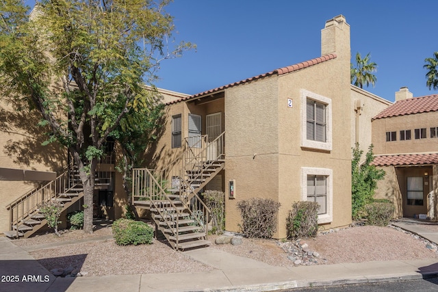 8787 E Mountain View Rd Unit 2008, Scottsdale, AZ 85258 - view of building exterior with stairway