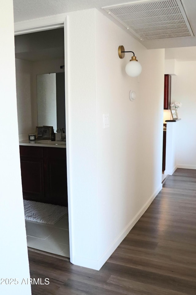 8787 E Mountain View Rd Unit 2008, Scottsdale, AZ 85258 - hall with wood finished floors, a sink, and baseboards