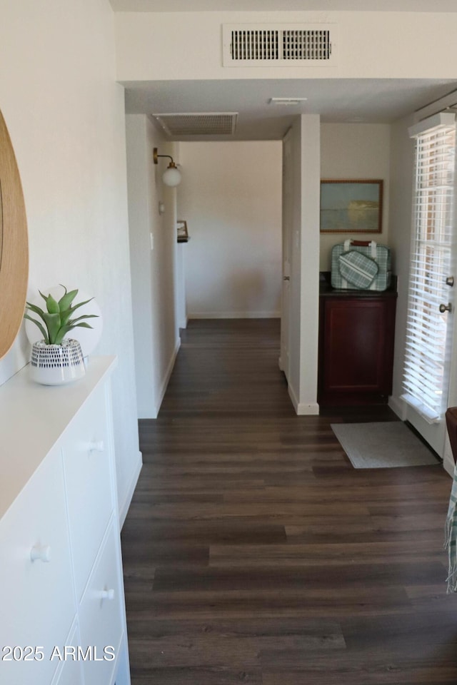 8787 E Mountain View Rd Unit 2008, Scottsdale, AZ 85258 - corridor featuring dark wood-type flooring and baseboards