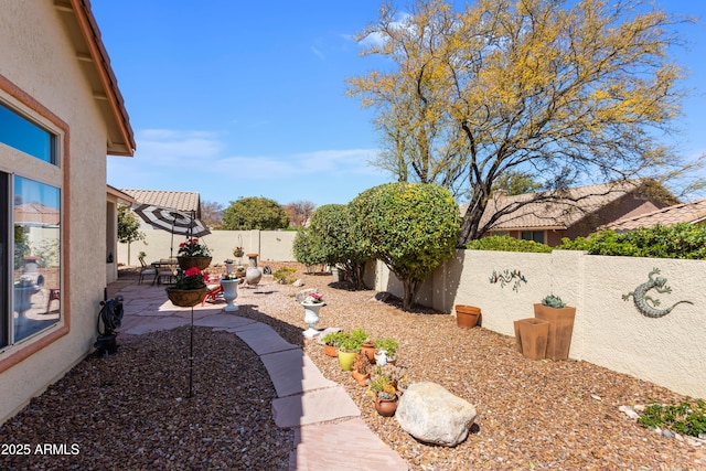2675 Tarina Way, Sierra Vista, AZ 85650 - fenced backyard featuring a patio area