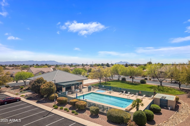 2675 Tarina Way, Sierra Vista, AZ 85650 - community pool with a mountain view, fence, and a patio area