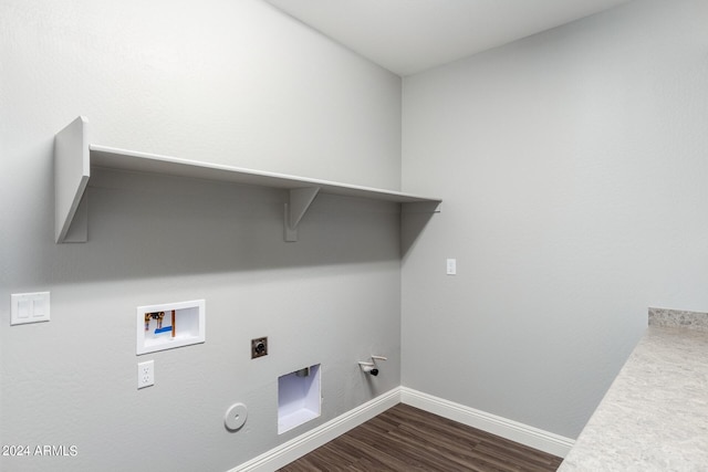 washroom with baseboards, gas dryer hookup, dark wood-type flooring, hookup for an electric dryer, and washer hookup