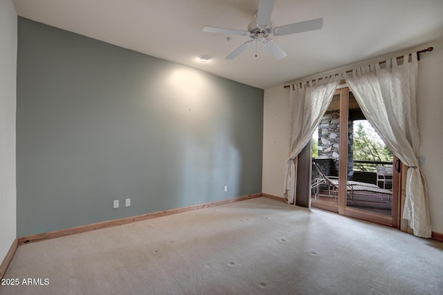 carpeted empty room with ceiling fan