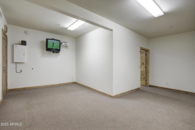 empty room with carpet flooring