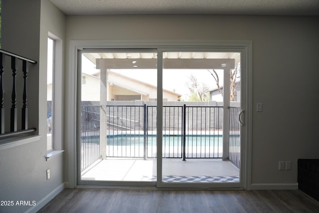 1632 E Saint Charles Ave, Phoenix, AZ 85042 - entryway with wood finished floors and plenty of natural light