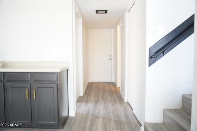 1632 E Saint Charles Ave, Phoenix, AZ 85042 - hall featuring wood finished floors and stairway