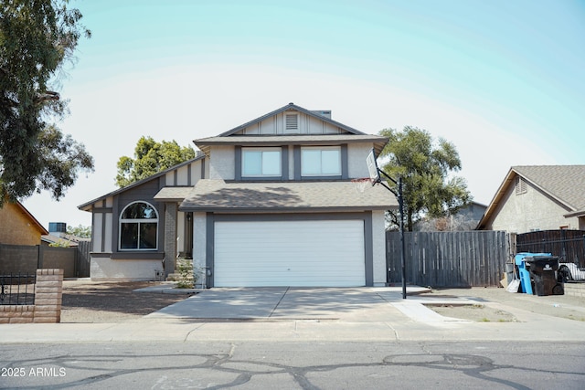1632 E Saint Charles Ave, Phoenix, AZ 85042 - view of front of home featuring driveway, a garage, and stucco siding