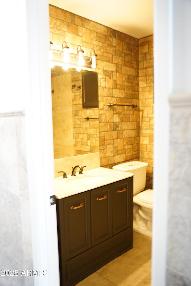 1632 E Saint Charles Ave, Phoenix, AZ 85042 - half bath with vanity and tile walls