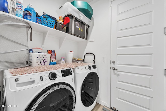 laundry area featuring laundry area and washer and clothes dryer